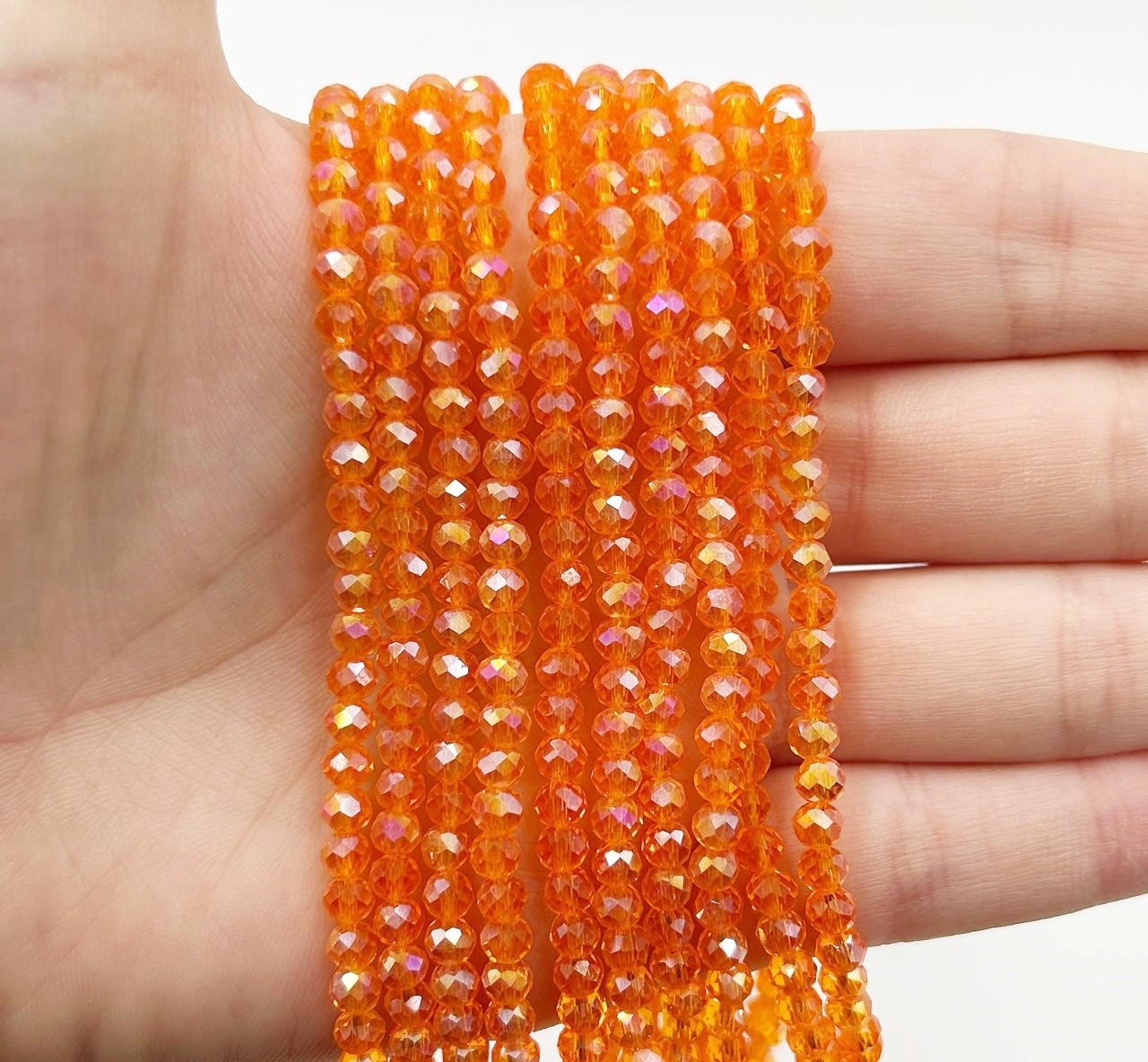Намистини кришталев (рондель) 4х3мм колір прозорий помаранчевий з АБ