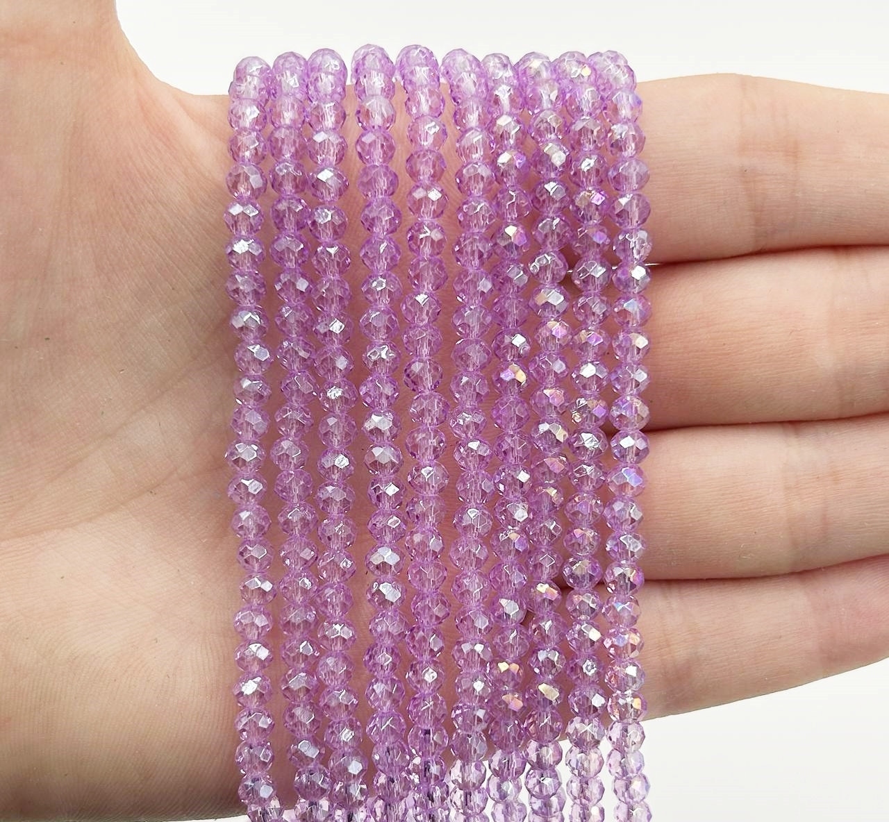 Намистини кришталев (рондель) 4х3мм колір прозорий бузковий з АБ