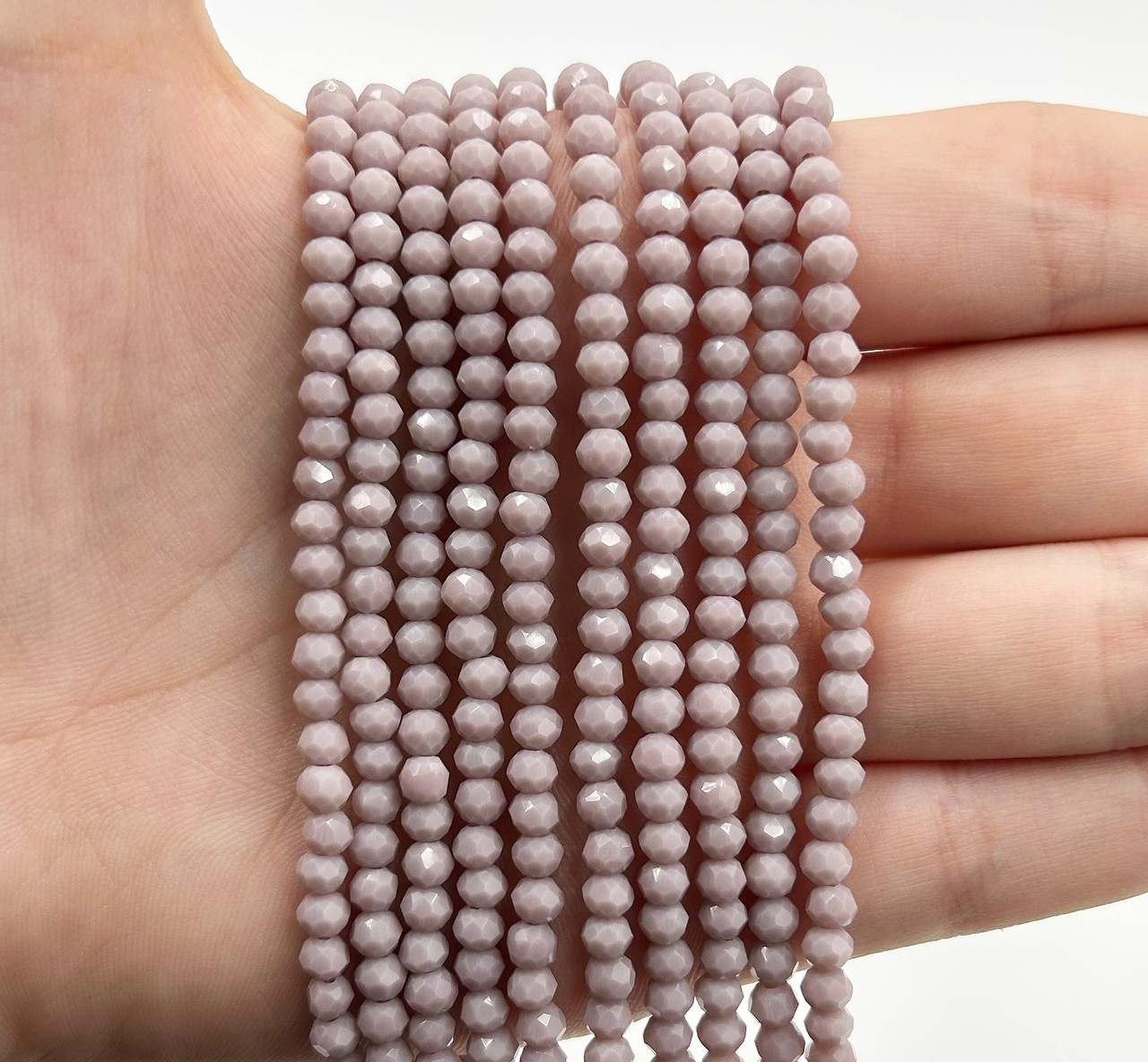 Намистини кришталев (рондель) 4х3мм колір непрозорий пудровий