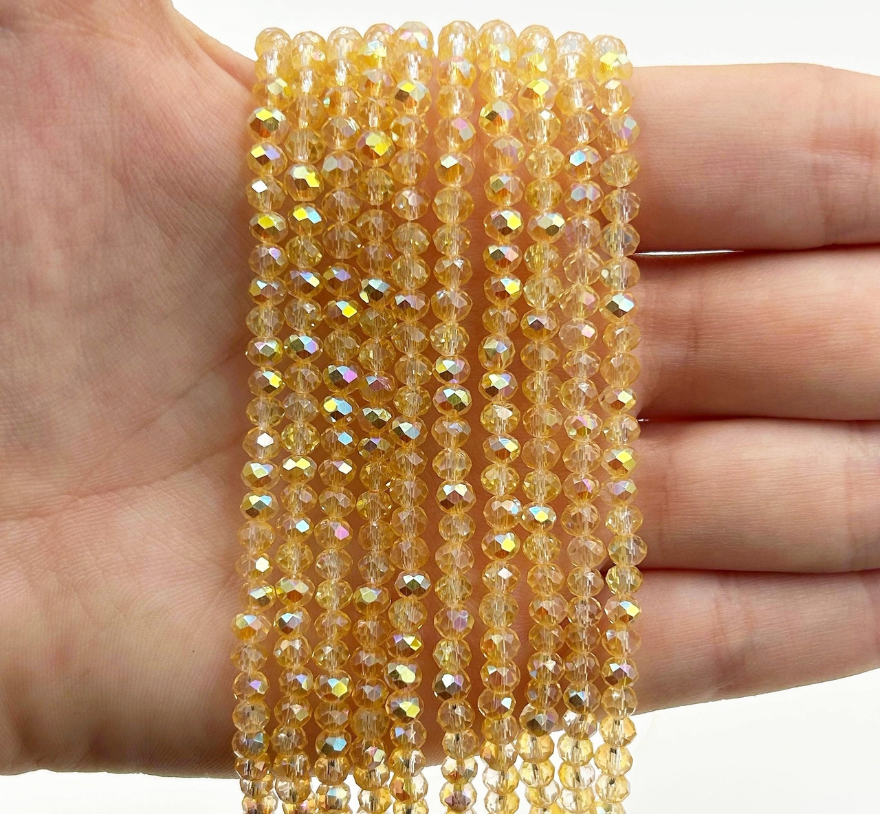 Намистини кришталев (рондель) 4х3мм колір прозорий лимонний з АБ