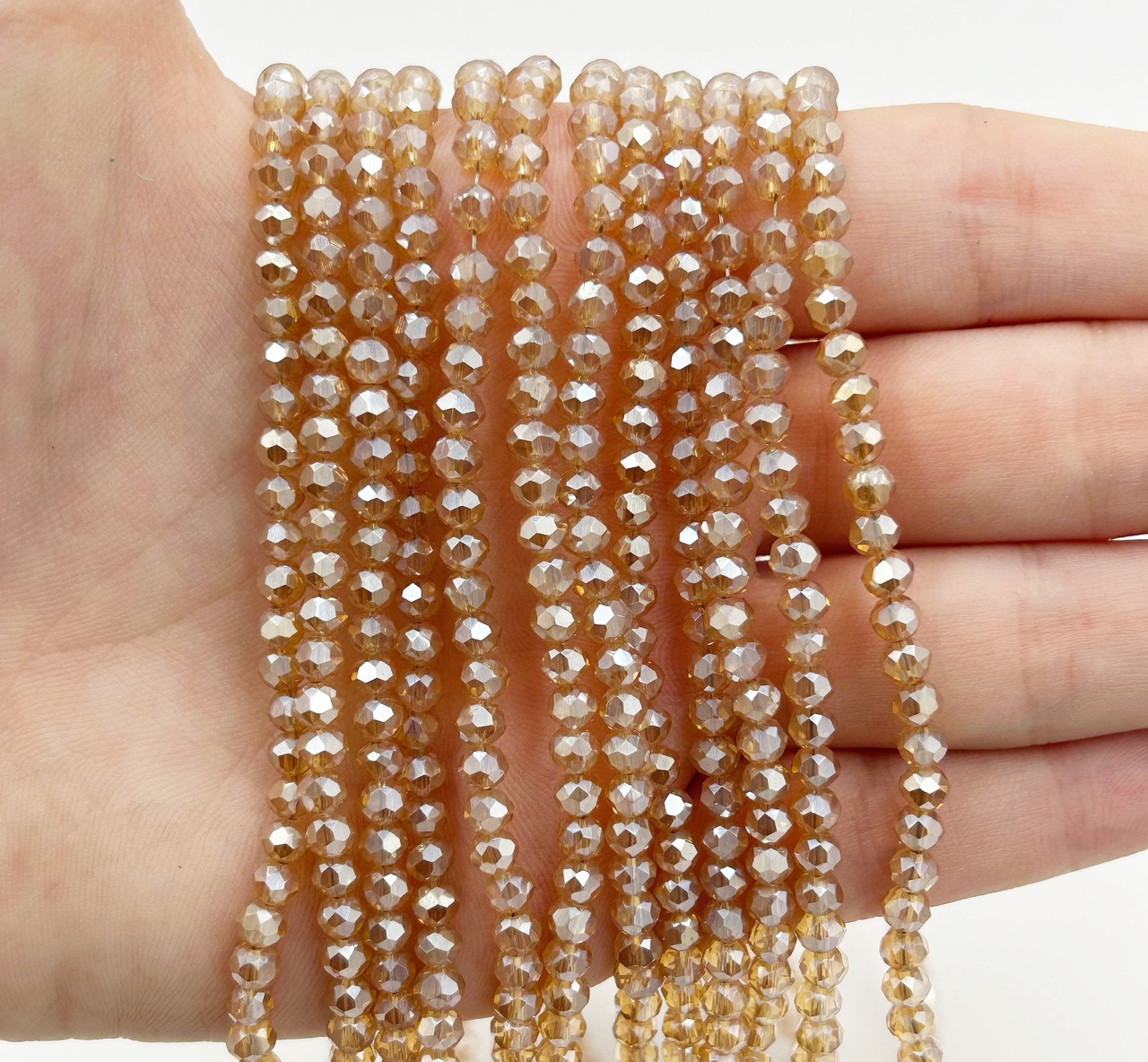 Намистини кришталев (рондель) 4х3мм колір прозорий світло-коричневий