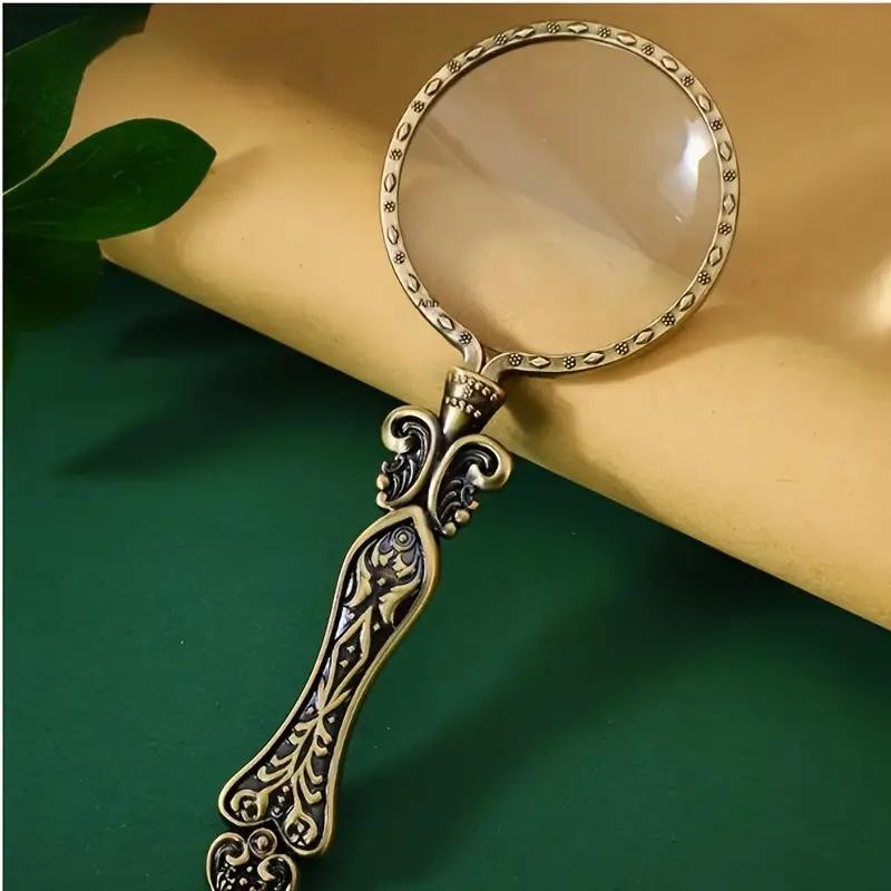 Лупа з металевою ручкою діаметр 5,5см