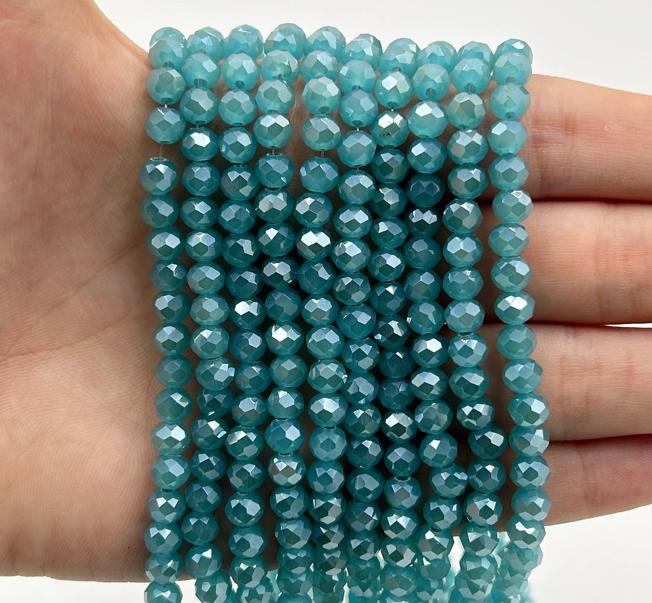 Намистини кришталев (рондель) 6х4мм колір напівпрозорий бірюзовий №346